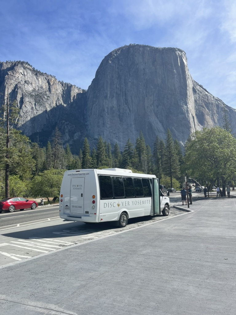 VIEW OF HALF DOME AND DISCOVER YOSEMITE BUS 